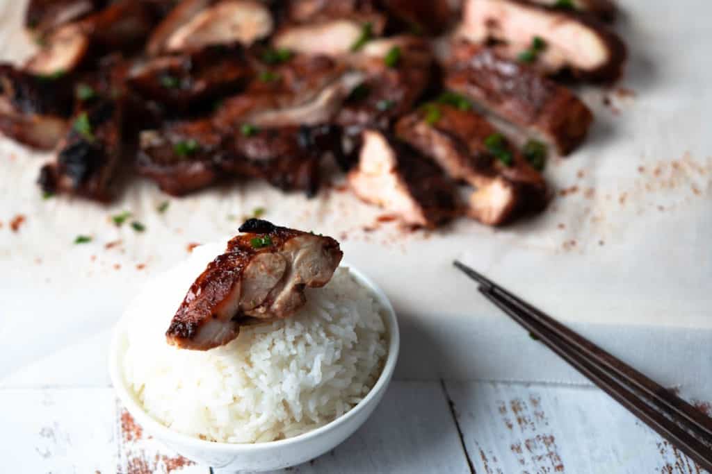 Char siu chicken on a bowl of rice.