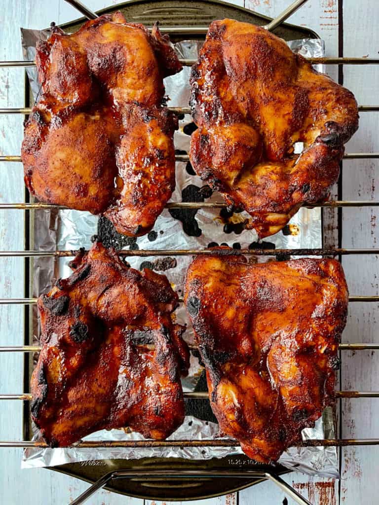 Char siu chicken charred to perfection and ready to be sliced.