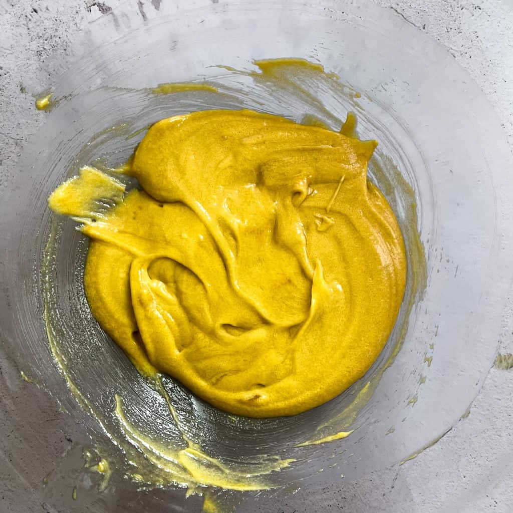 Glossy and creamy batter.