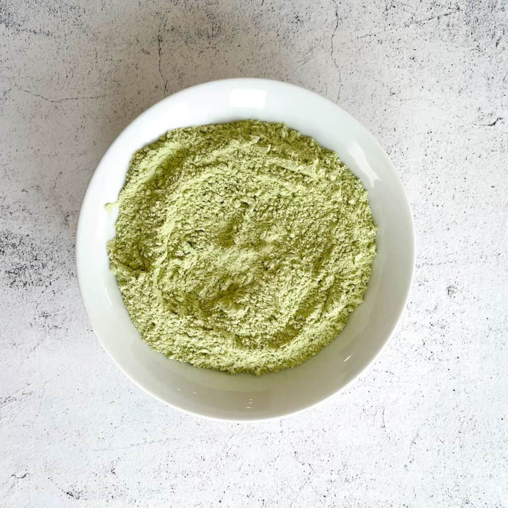 Bowl of dry ingredients for matcha cookies.