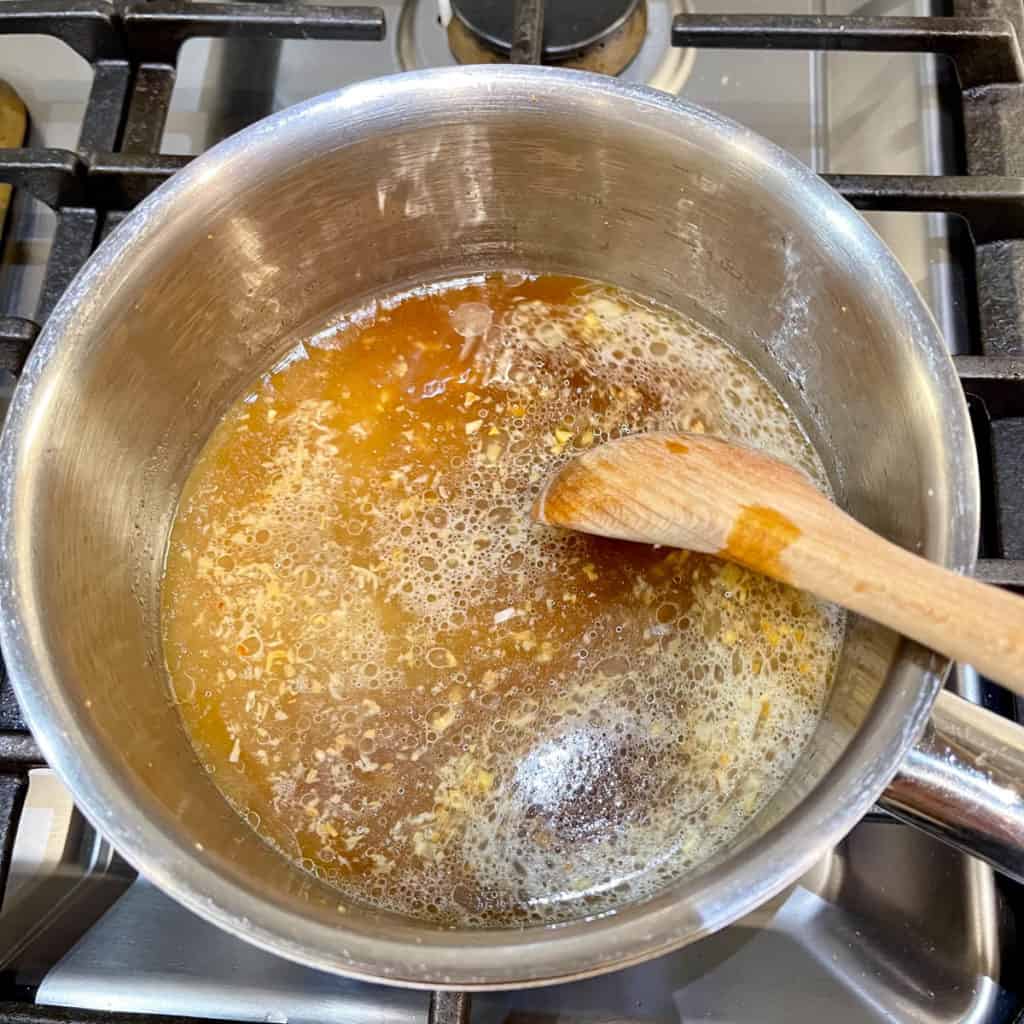 Deglaze pot with sauce mixture.
