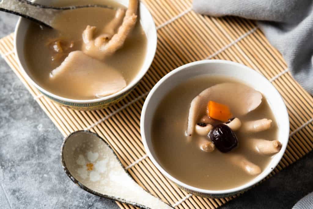 Two bowls of chicken foot soup.