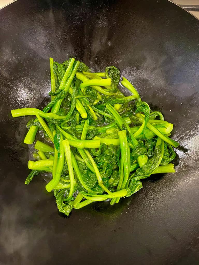 Stir fried yu choy ready to be served.