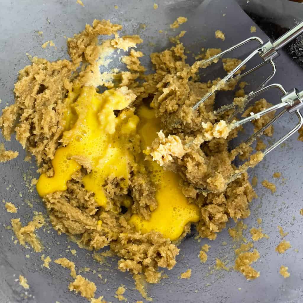 Beaten egg added to cream butter and sugar.