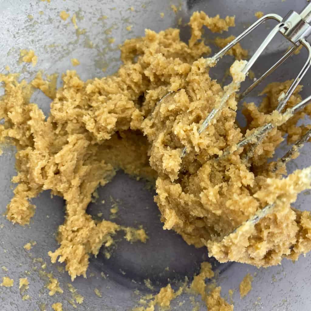 Close up of creamed cool butter and sugar.