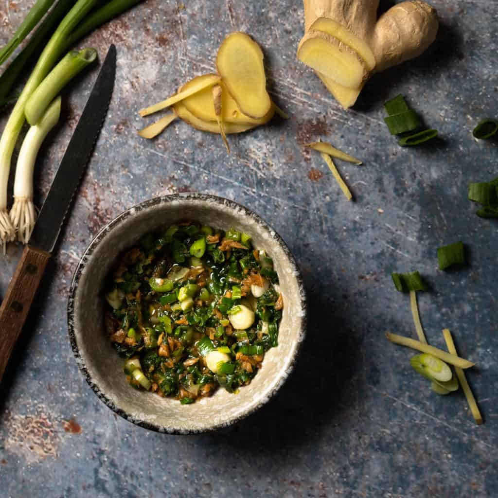 Close up view of ginger scallion sauce.