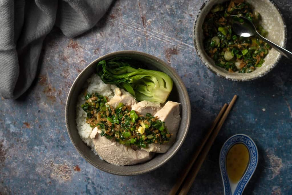 Ginger scallion sauce over white cut chicken.