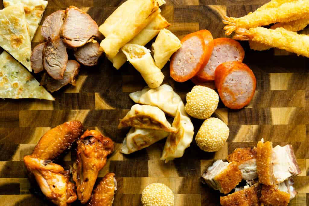 Lay out Asian appetizers beside the meats.