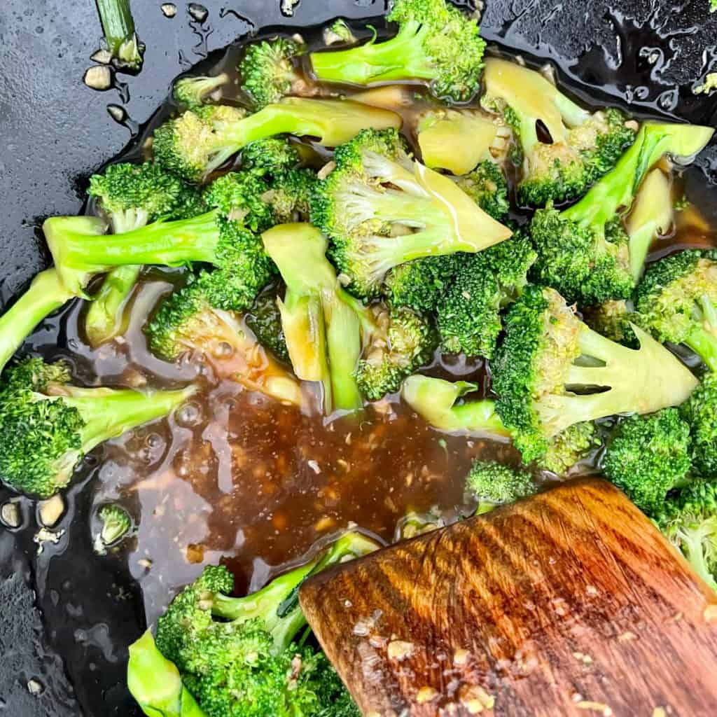 Thickened stir fry sauce in a wok.