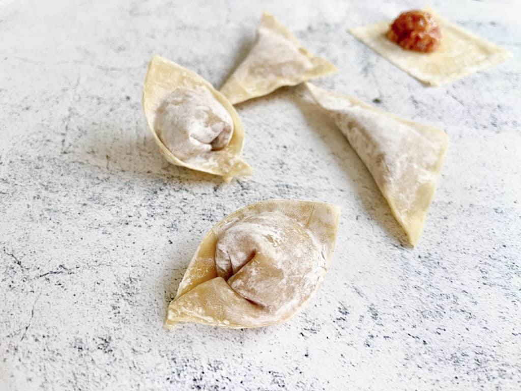 Ingot style wonton wrapping.