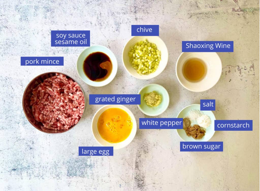 Pork wontons filling ingredients displayed.