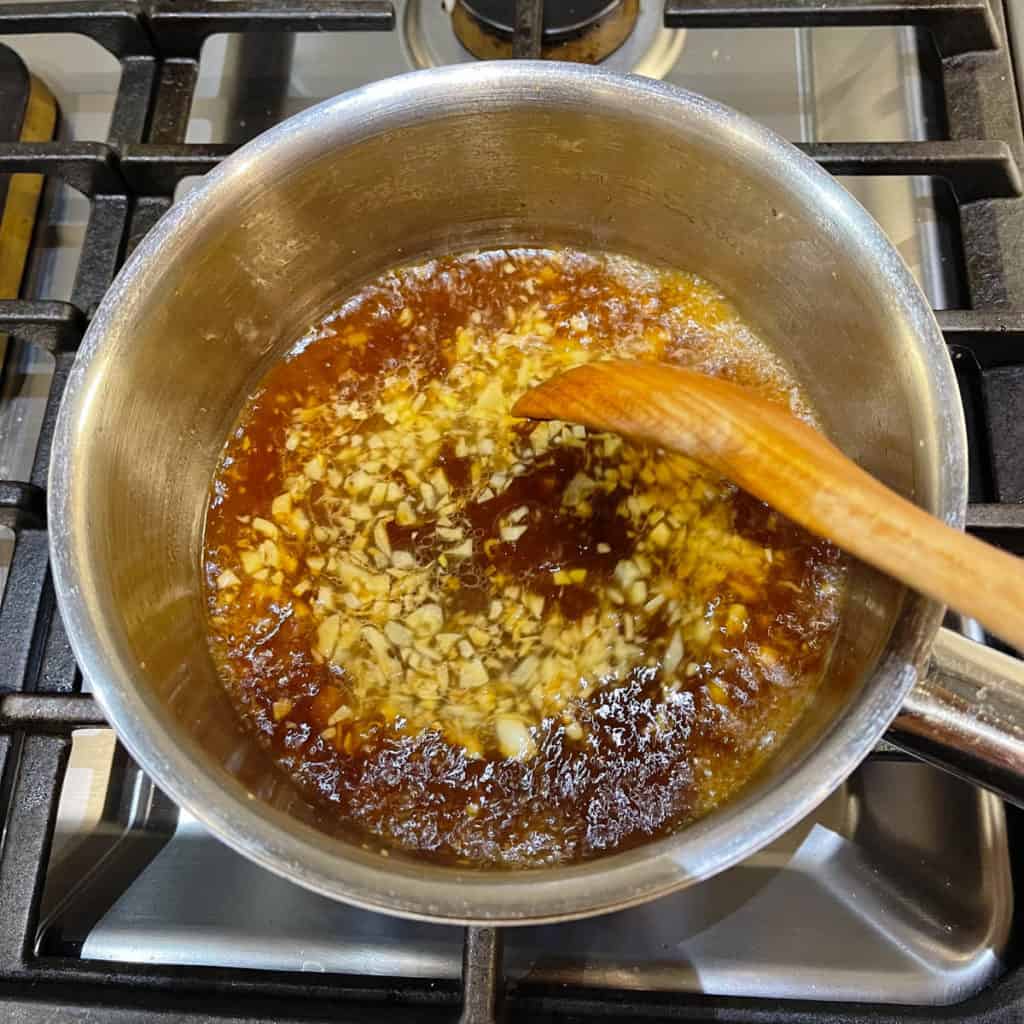 Stir and bring brown sauce mixture to a simmer.