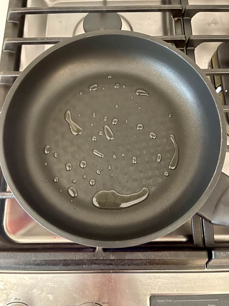 Pan with heated oil.