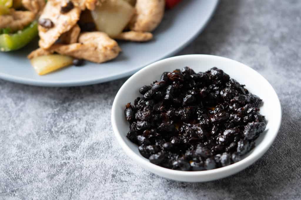 Dish of whole fermented black beans.