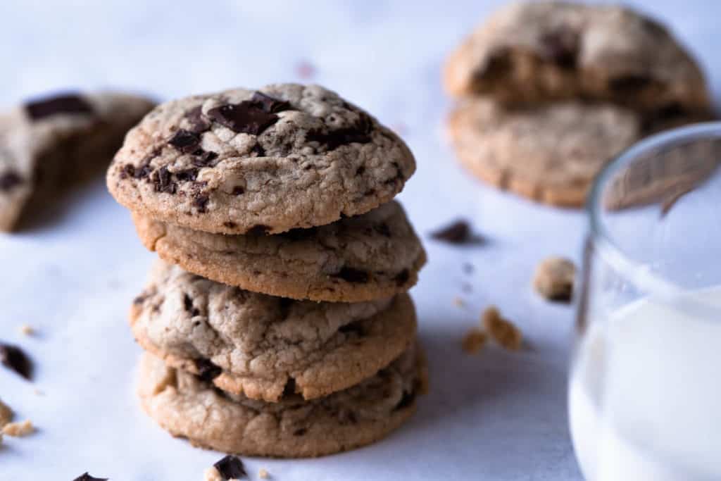 Stacked chocolate chip cookies.