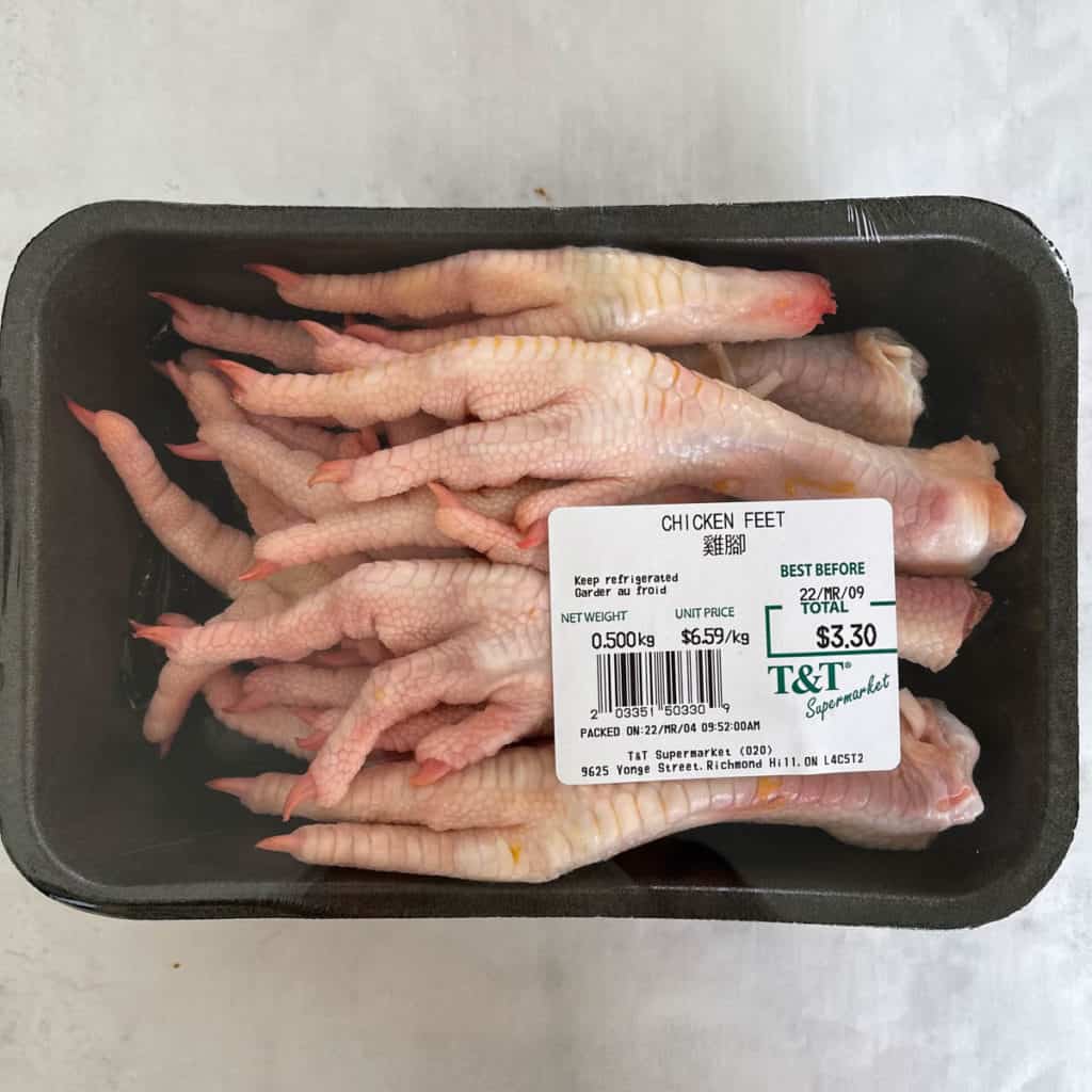 Chicken feet can be purchased in the meat section prepackaged.