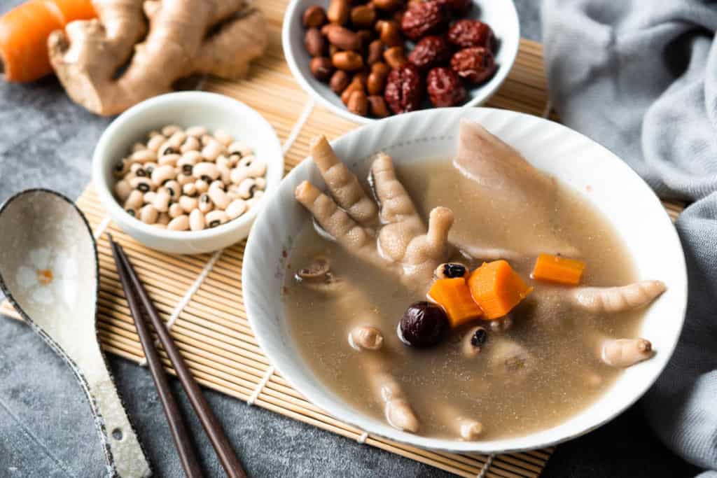 Chicken feet soup with main ingredients of red dates, black eye peas and red peanuts.  Optional ingredients including ginger and carrot.
