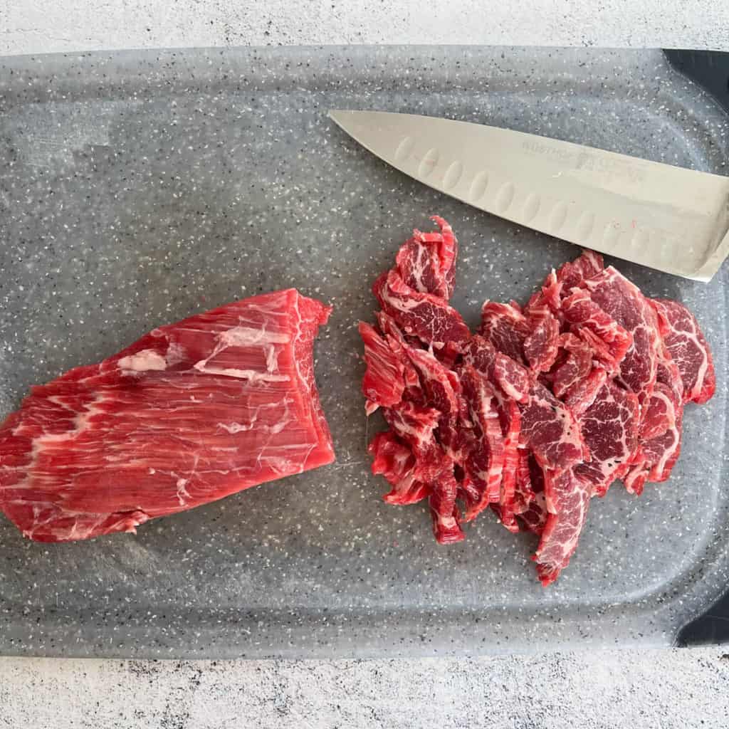 Slices of beef flank cut against the grain.